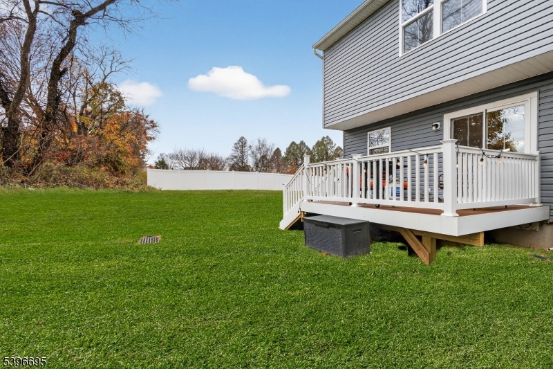 55 Limestone Boulevard Washington, NJ 07882 - Photo 24 of 25 a view of a house with a yard and deck