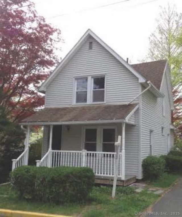 11 Huber Avenue Middletown, CT 06457 - Photo 1 of 1 a front view of a house with a yard