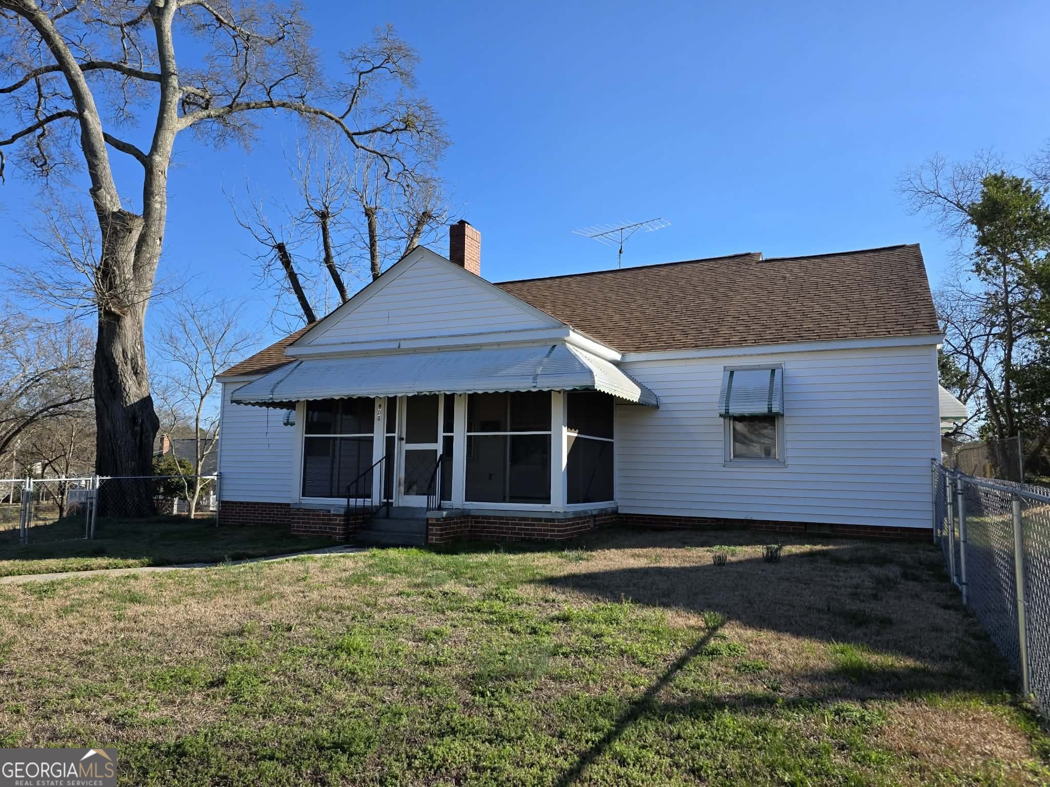 600 4th Avenue Southwest Thomaston, GA 30286 - Photo 1 of 1 a front view of a house with a yard
