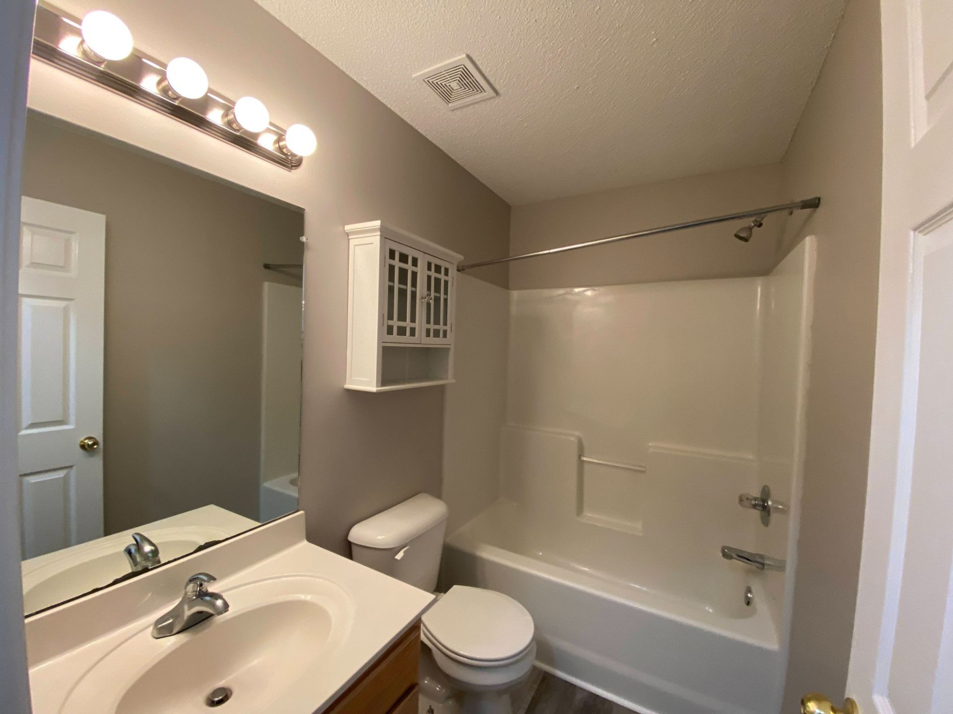 428 Filmore Road Oak Grove, KY 42262 - Photo 12 of 16 a bathroom with a sink toilet and shower