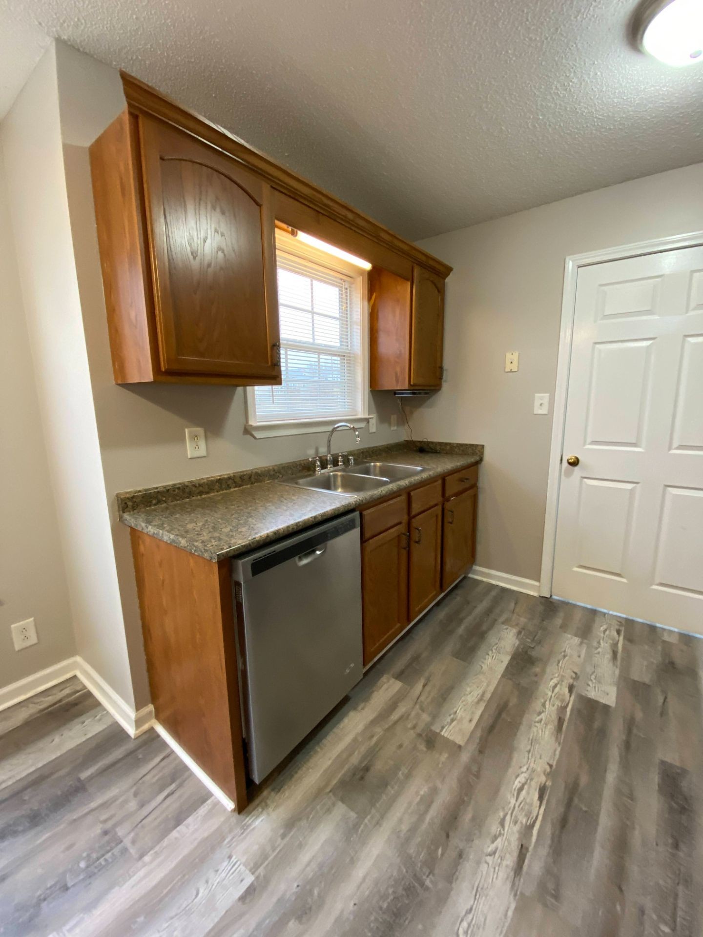 428 Filmore Road Oak Grove, KY 42262 - Photo 4 of 16 a kitchen with stainless steel appliances granite countertop a stove a sink and a microwave
