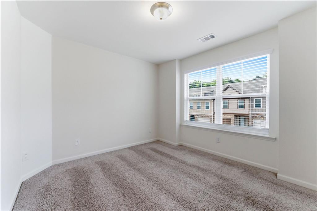 2717 Avanti Way Decatur, GA 30035 - Photo 11 of 15 an empty room with a window
