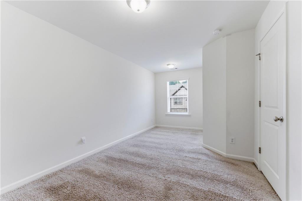 2717 Avanti Way Decatur, GA 30035 - Photo 10 of 15 a view of an empty room with a window