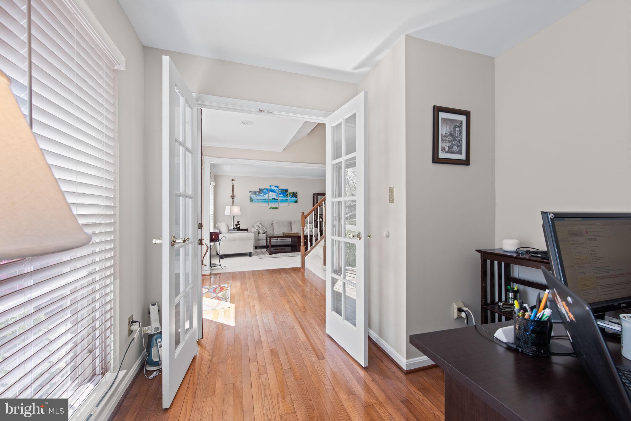 8104 Creekview Drive Springfield, VA 22153 - Photo 17 of 39 a view of a workspace with wooden floor