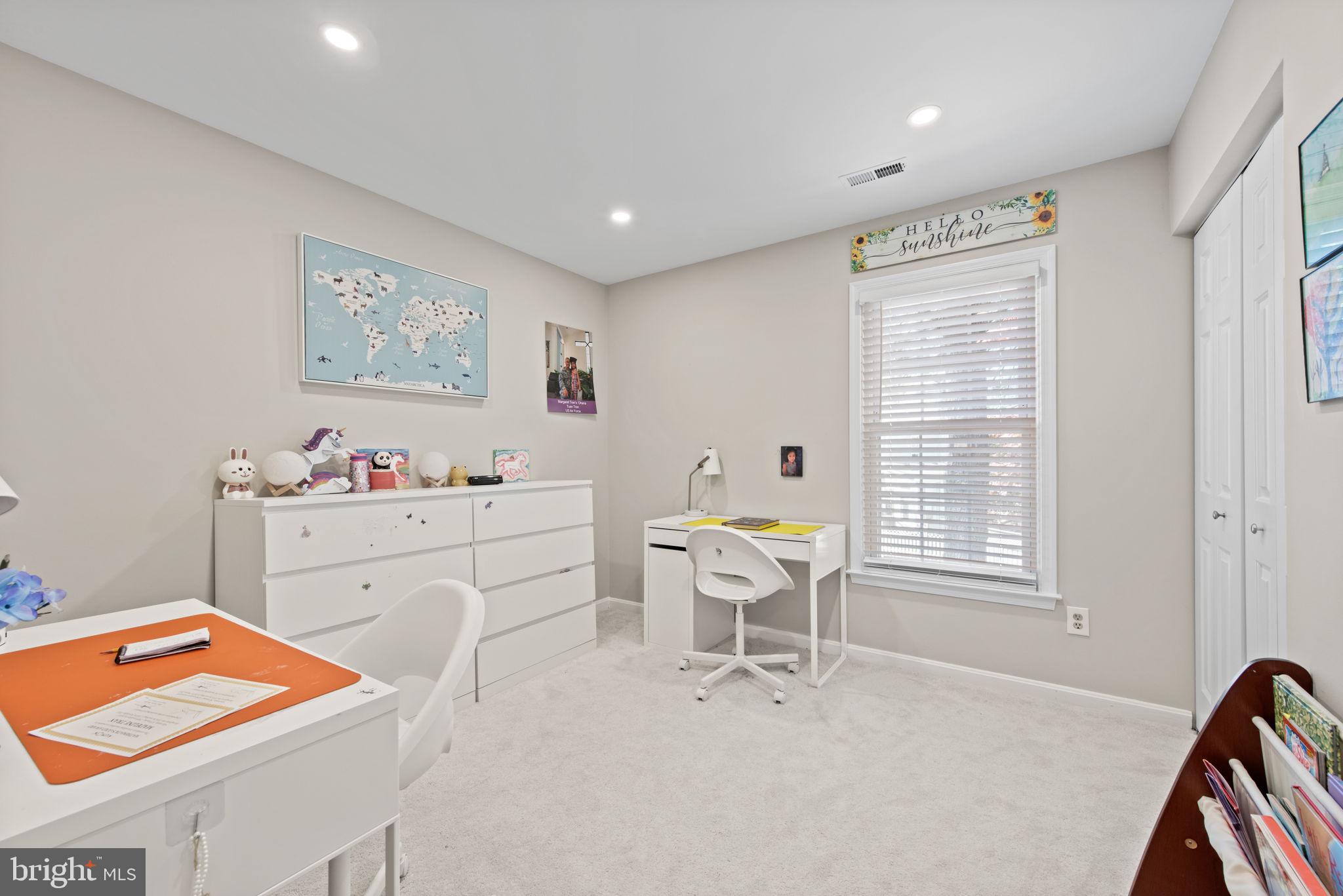 8104 Creekview Drive Springfield, VA 22153 - Photo 23 of 39 a room with furniture a air conditioner vent and a window