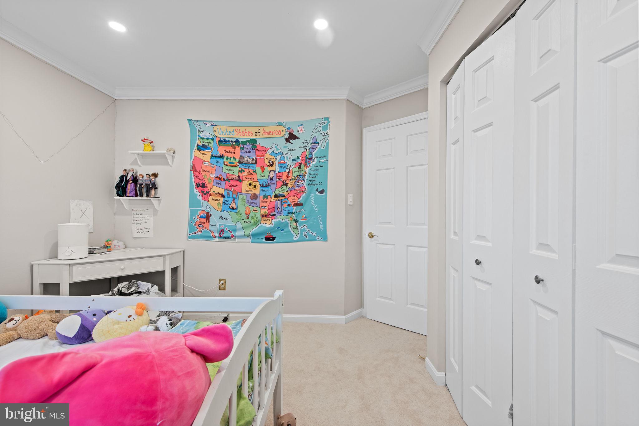 8104 Creekview Drive Springfield, VA 22153 - Photo 26 of 39 a bedroom with a bed and a window