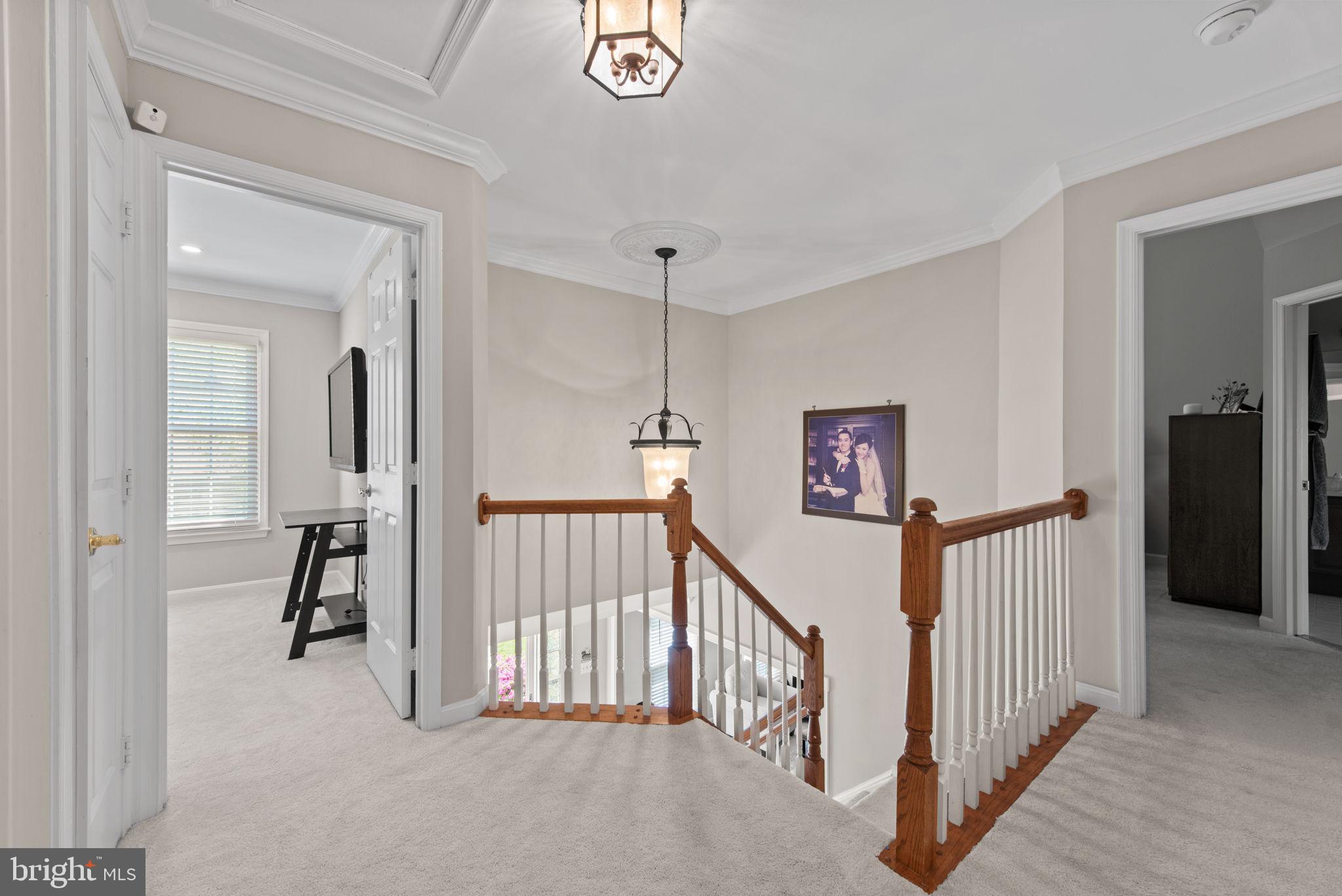 8104 Creekview Drive Springfield, VA 22153 - Photo 27 of 39 a view of a hallway with closet and stairs