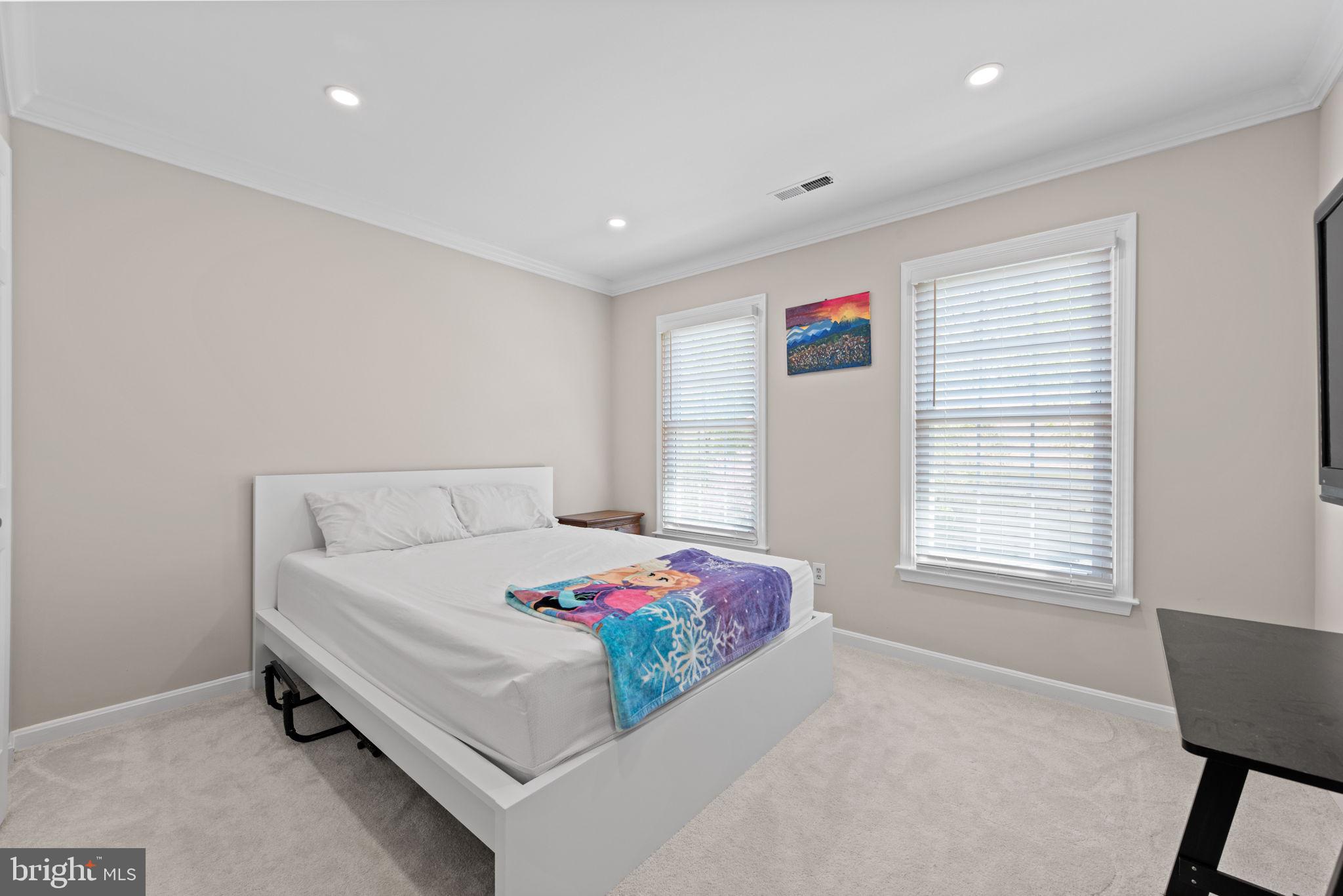 8104 Creekview Drive Springfield, VA 22153 - Photo 29 of 39 a bedroom with a bed and a window