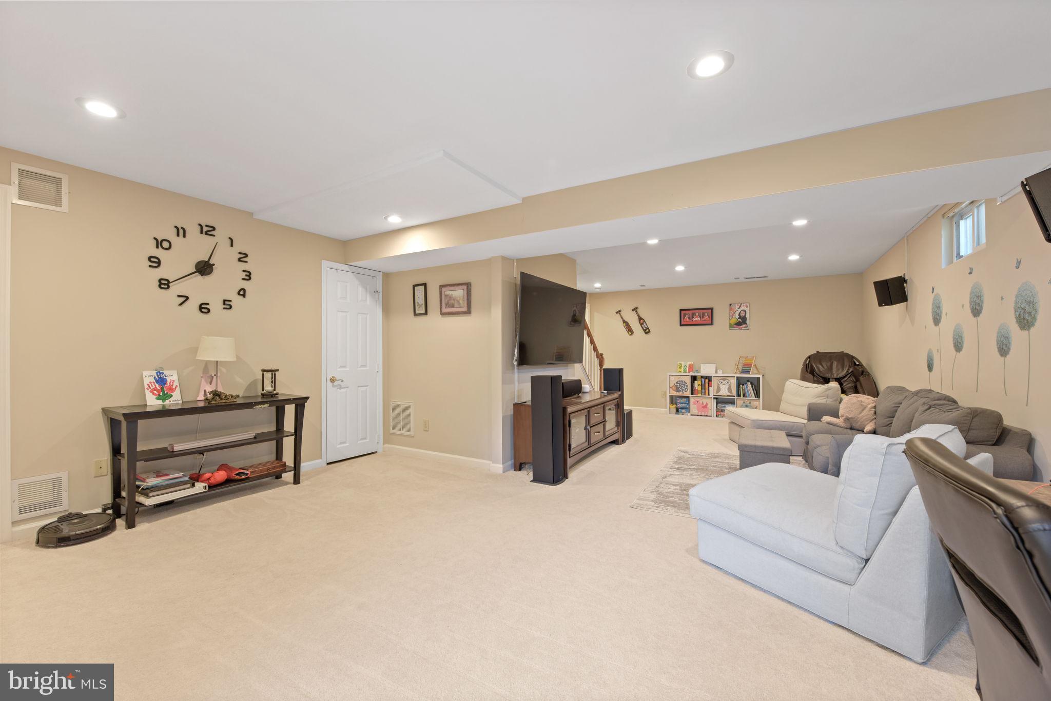 8104 Creekview Drive Springfield, VA 22153 - Photo 35 of 39 a living room with furniture