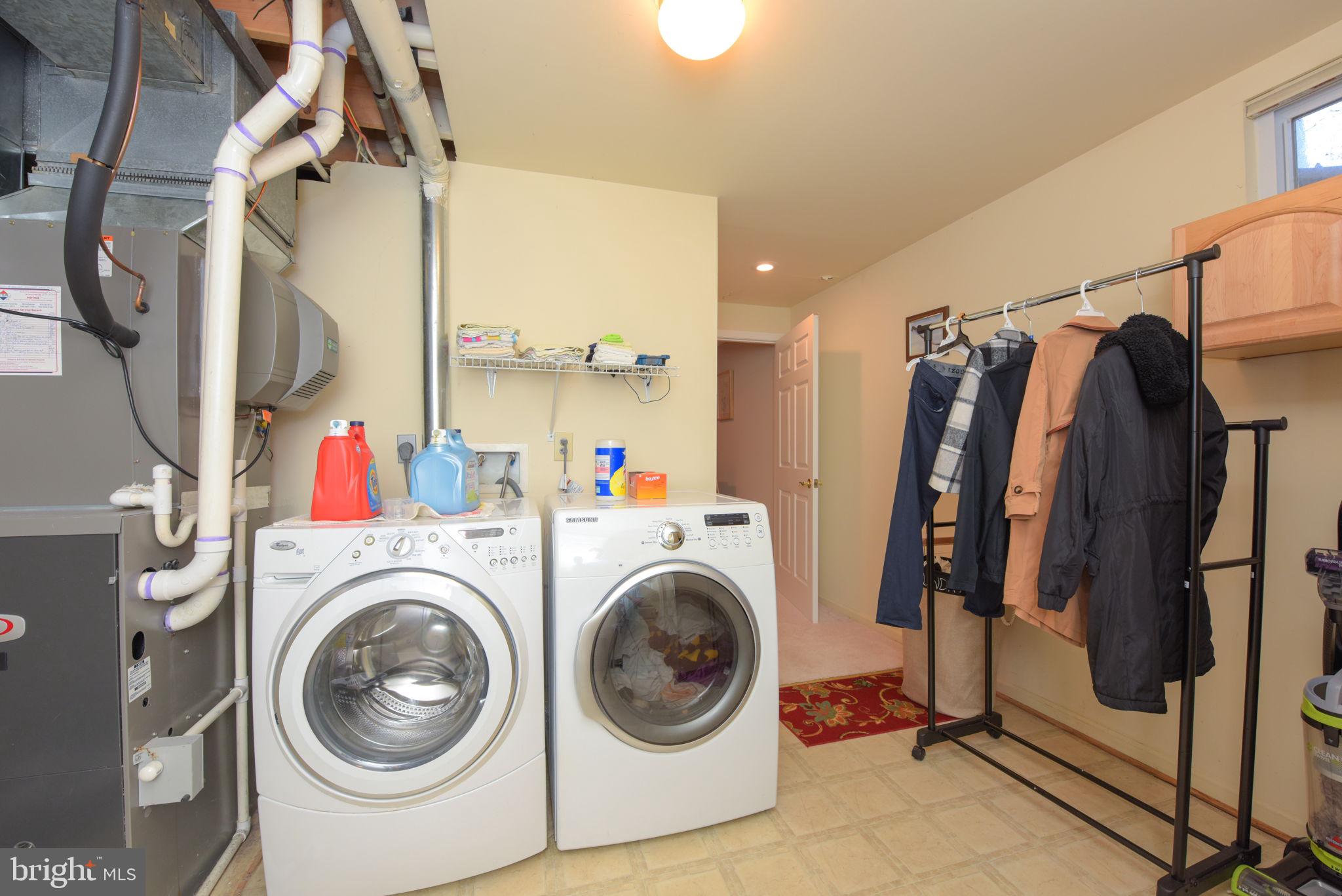 8104 Creekview Drive Springfield, VA 22153 - Photo 37 of 39 a utility room with dryer and washer