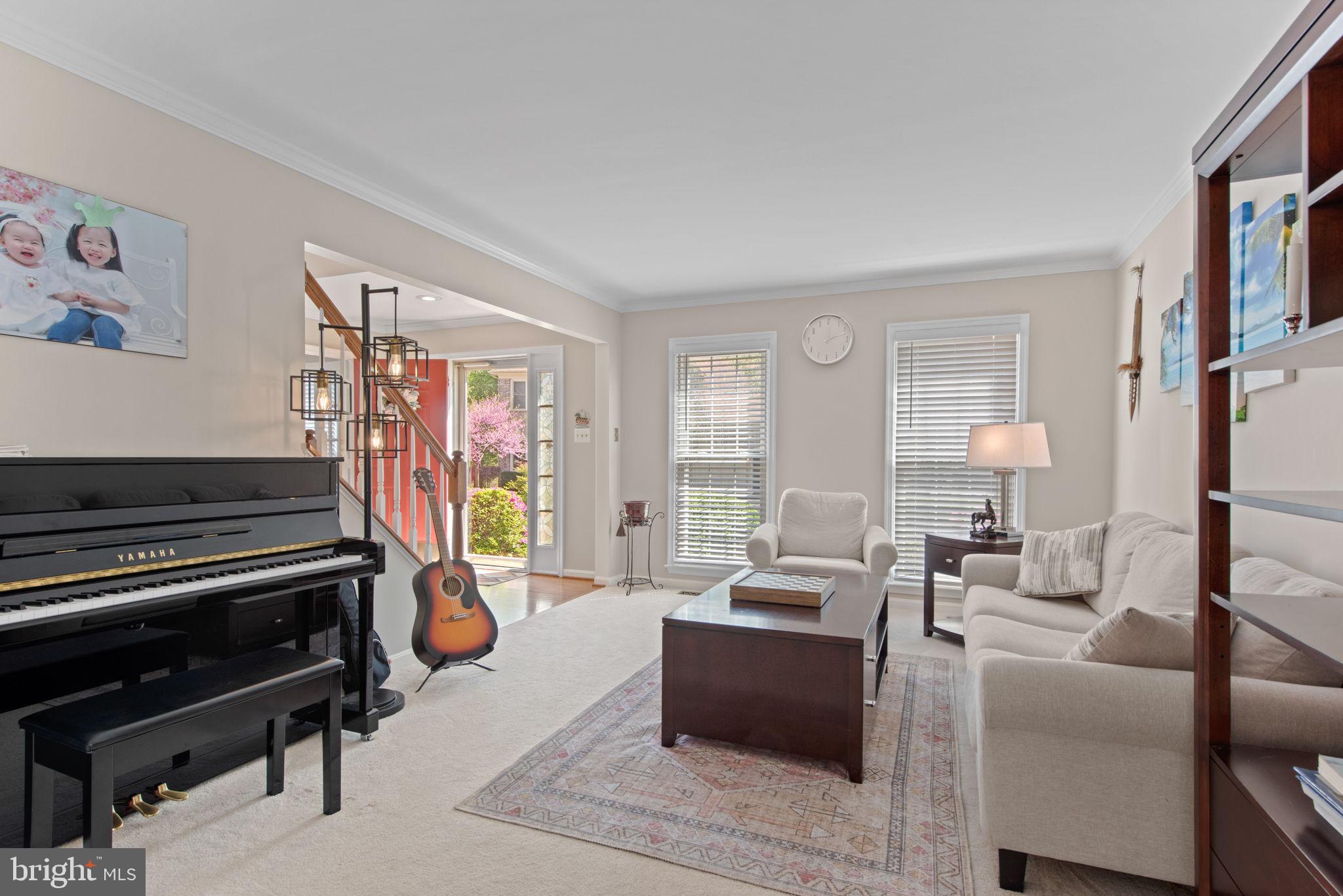 8104 Creekview Drive Springfield, VA 22153 - Photo 4 of 39 a living room with furniture and a piano