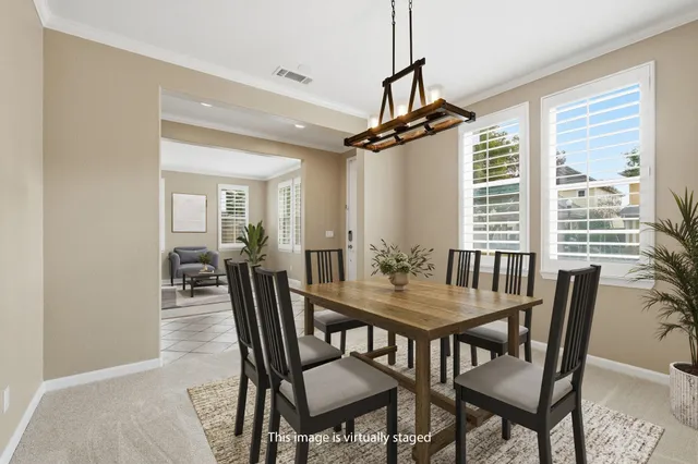 a view of a dining room and livingroom view