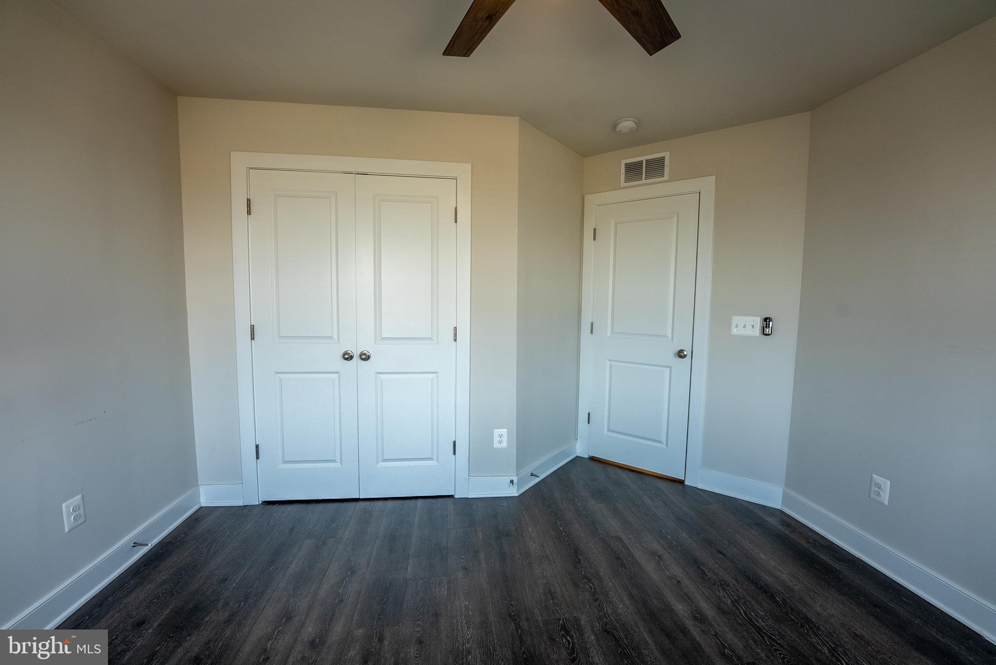 1622 Sandpiper Bay Loop Dumfries, VA 22026 - Photo 15 of 47 wooden floor in an empty room