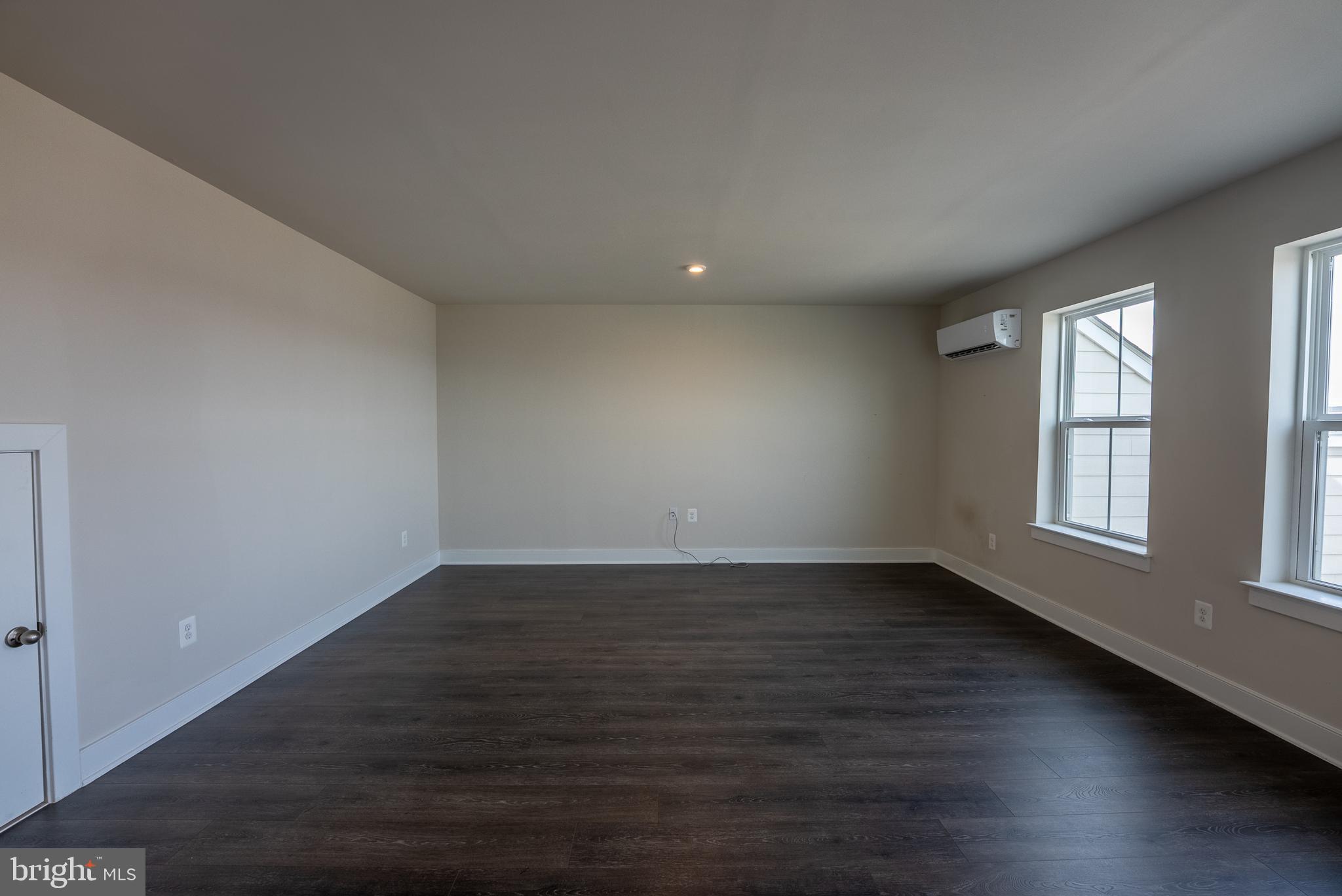 1622 Sandpiper Bay Loop Dumfries, VA 22026 - Photo 20 of 47 an empty room with wooden floor and windows