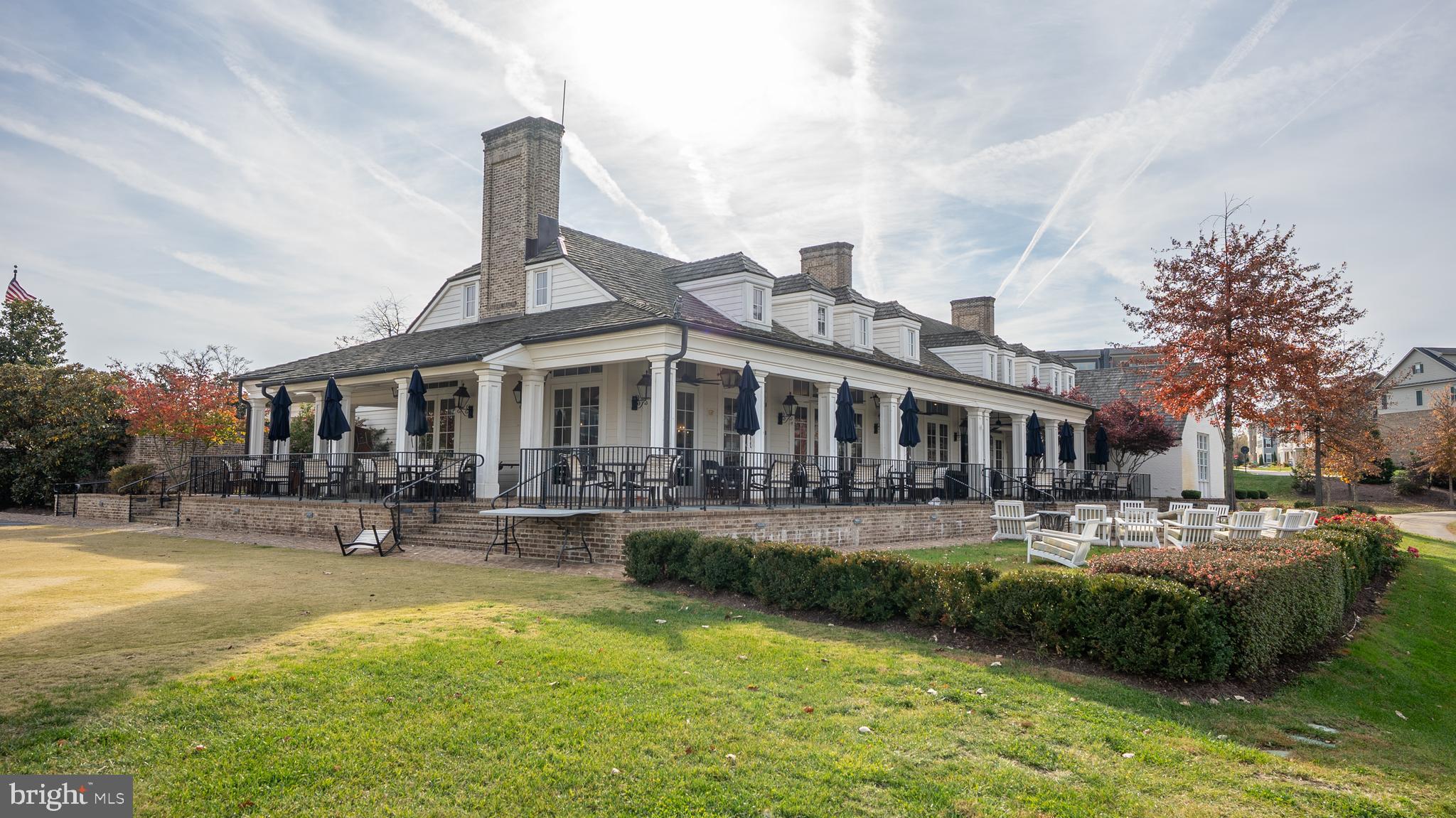 1622 Sandpiper Bay Loop Dumfries, VA 22026 - Photo 41 of 47 a front view of a house with swimming pool table and chairs