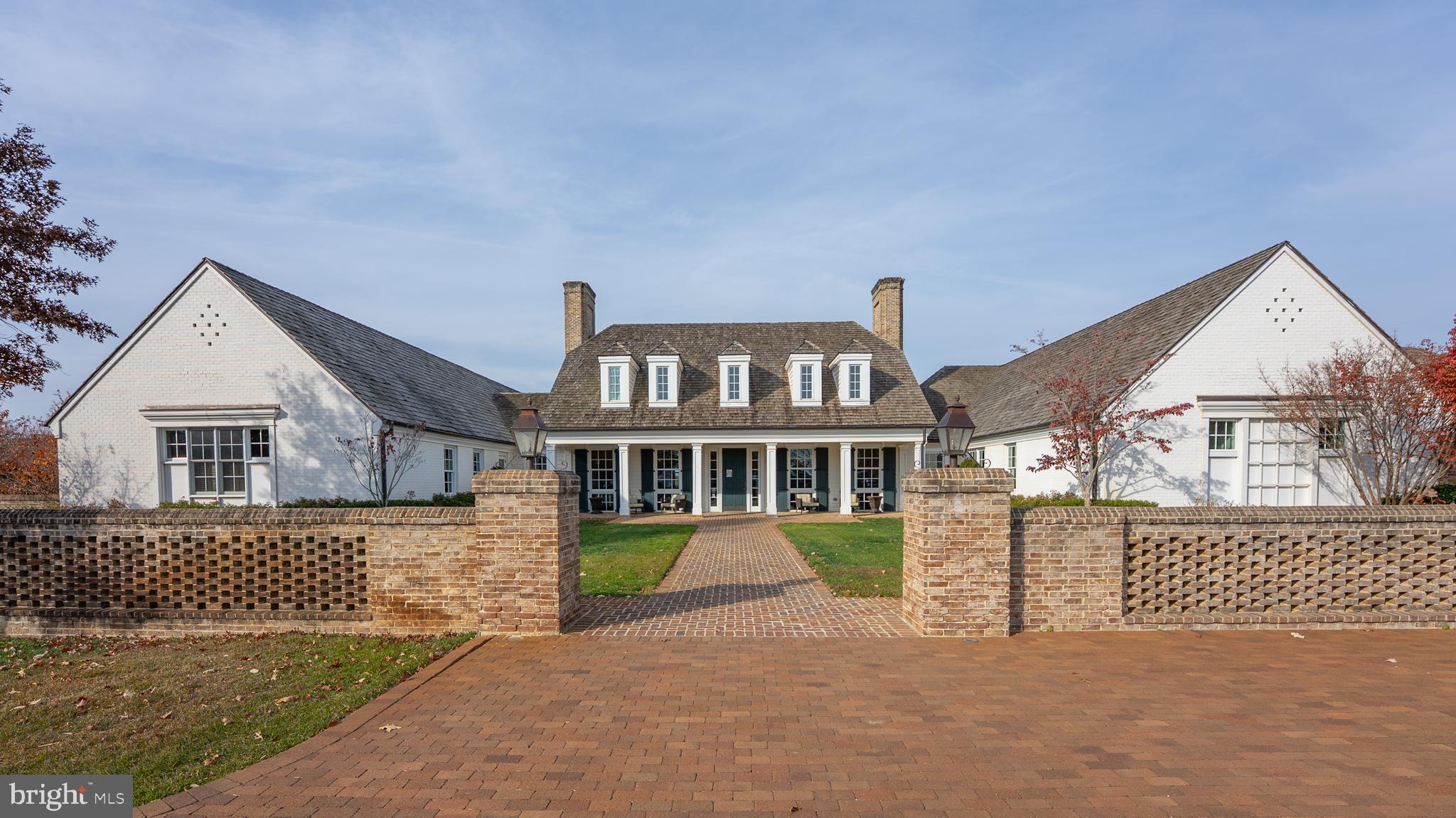 1622 Sandpiper Bay Loop Dumfries, VA 22026 - Photo 42 of 47 front view of a house with a yard
