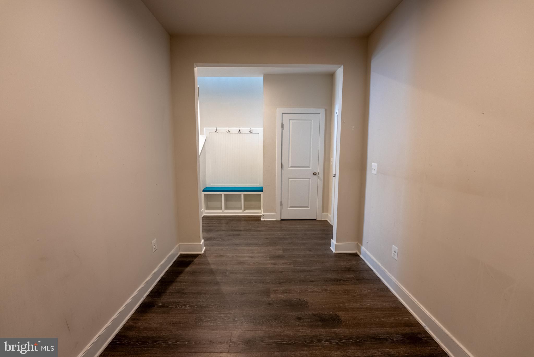 1622 Sandpiper Bay Loop Dumfries, VA 22026 - Photo 6 of 47 a view of a hallway with wooden floor