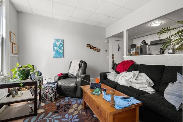 a bedroom with furniture and a couch