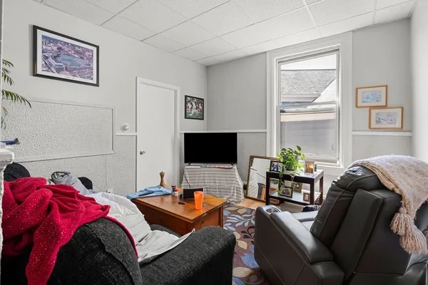 a bedroom with a bed and desk