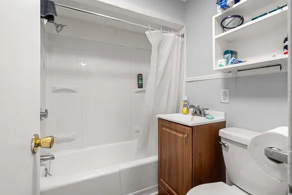 a bathroom with a sink toilet and bathtub