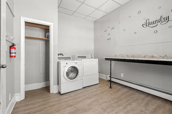 a utility room with dryer and washer
