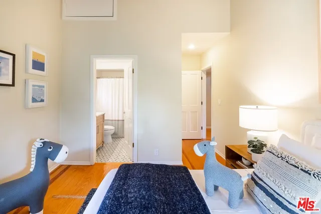 a bedroom with furniture and a bed