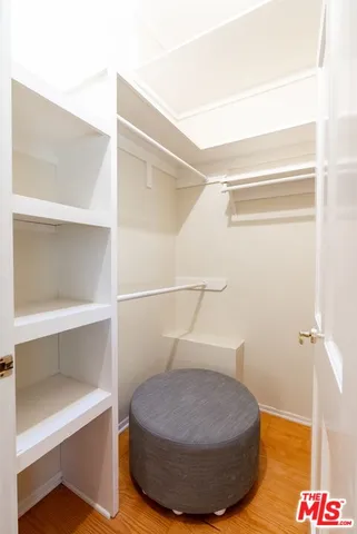 a bathroom with a sink and shower
