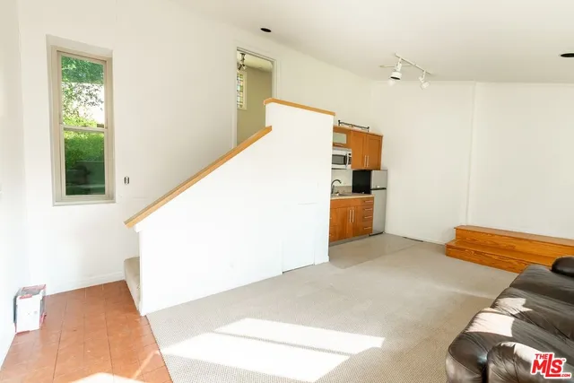 a view of hallway with stairs