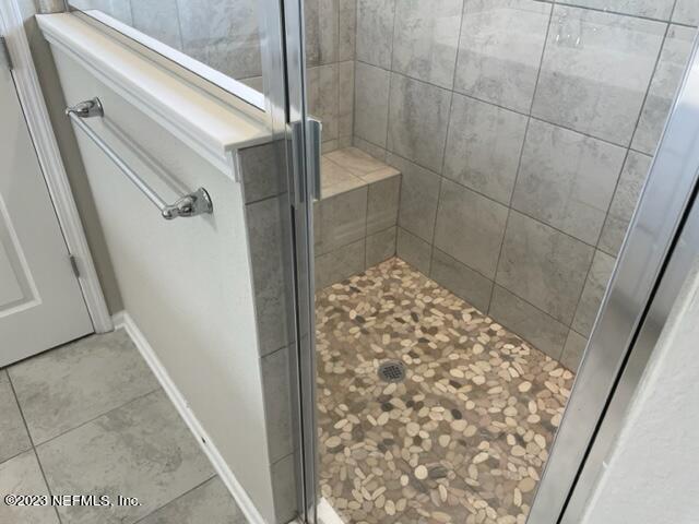 2218 Eagle Talon Circle Fleming Island, FL 32003 - Photo 20 of 40 a bathroom with a shower