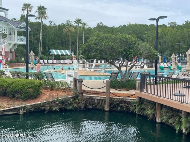 2218 Eagle Talon Circle Fleming Island, FL 32003 - Photo 3 of 40 a view of a house with a yard and sitting area