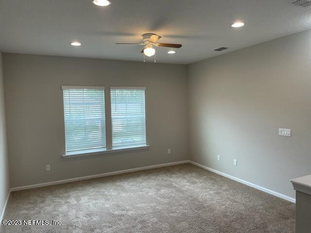 2218 Eagle Talon Circle Fleming Island, FL 32003 - Photo 33 of 40 an empty room with a window