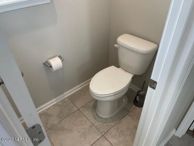 2218 Eagle Talon Circle Fleming Island, FL 32003 - Photo 35 of 40 a white toilet sitting next to a shower