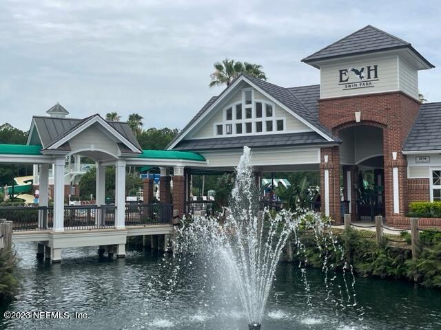 2218 Eagle Talon Circle Fleming Island, FL 32003 - Photo 4 of 40 a front view of a house with garden