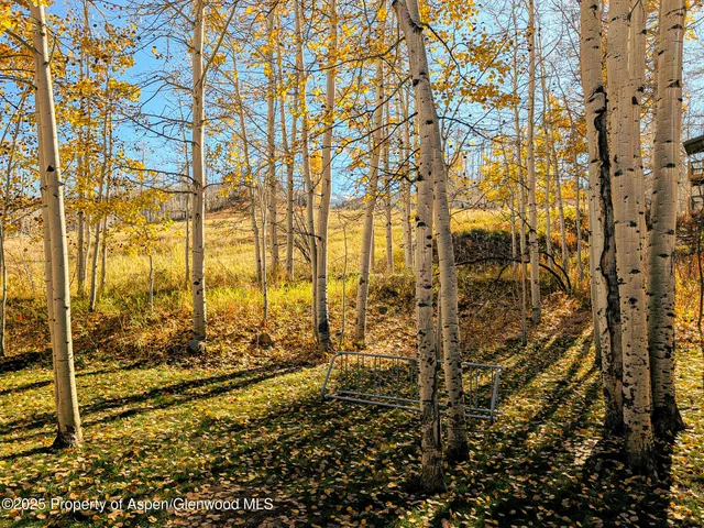 a view of residential house with parking space