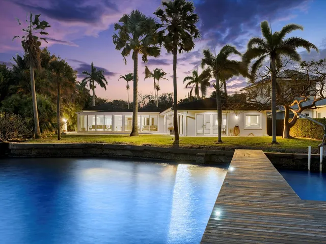 a view of swimming pool with outdoor seating