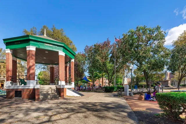 a view of a building with a street