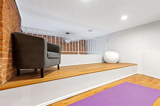 a view of a living room and dining room