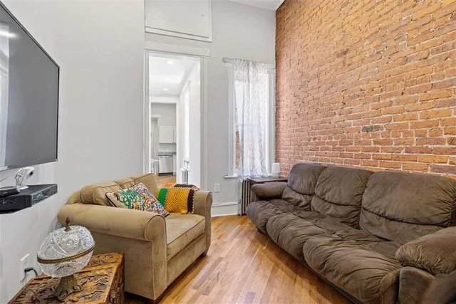 a living room with furniture and a couch