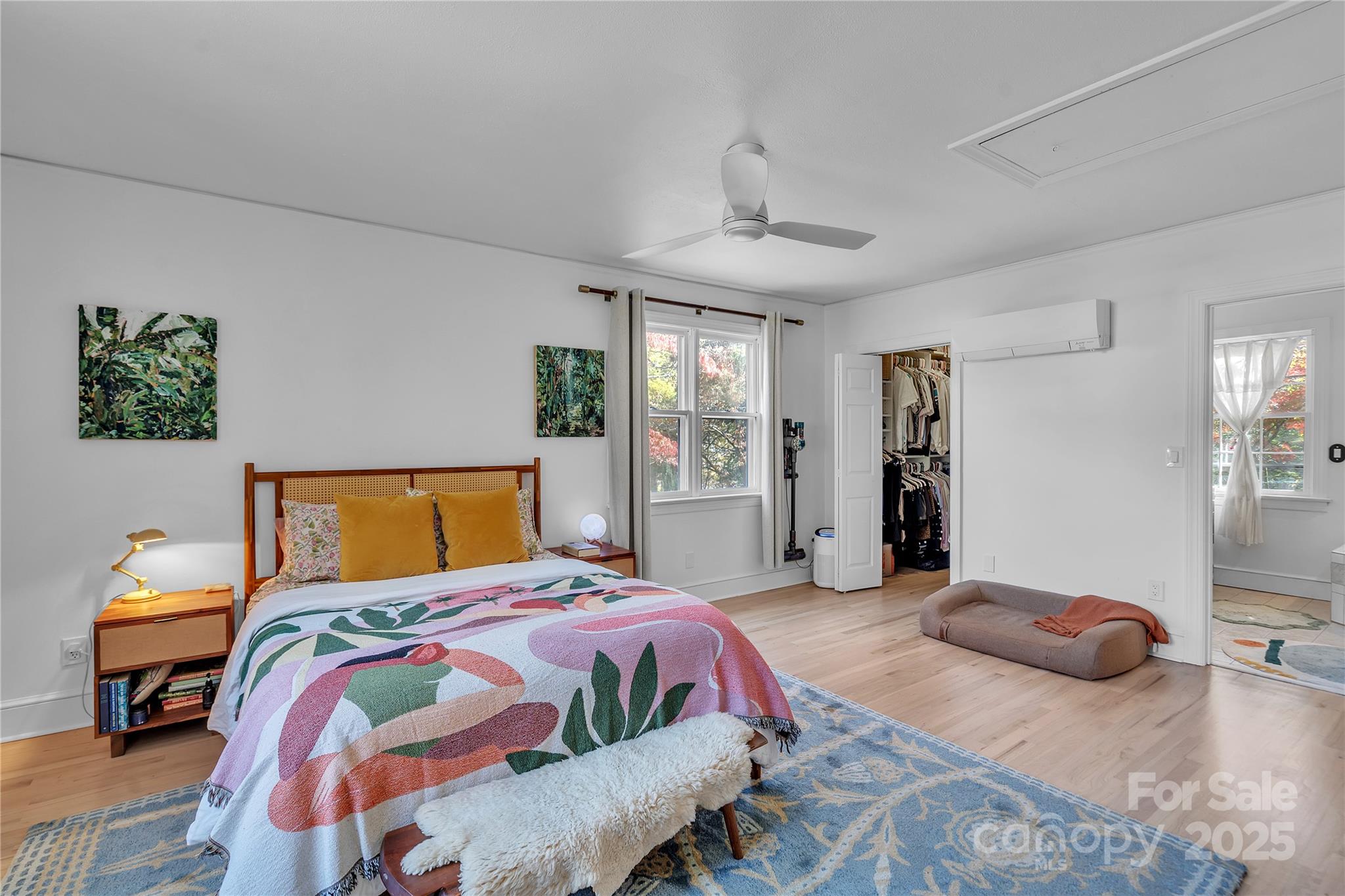 35 Wilcox Road Tryon, NC 28782 - Photo 13 of 24 a bedroom with a bed and a chair