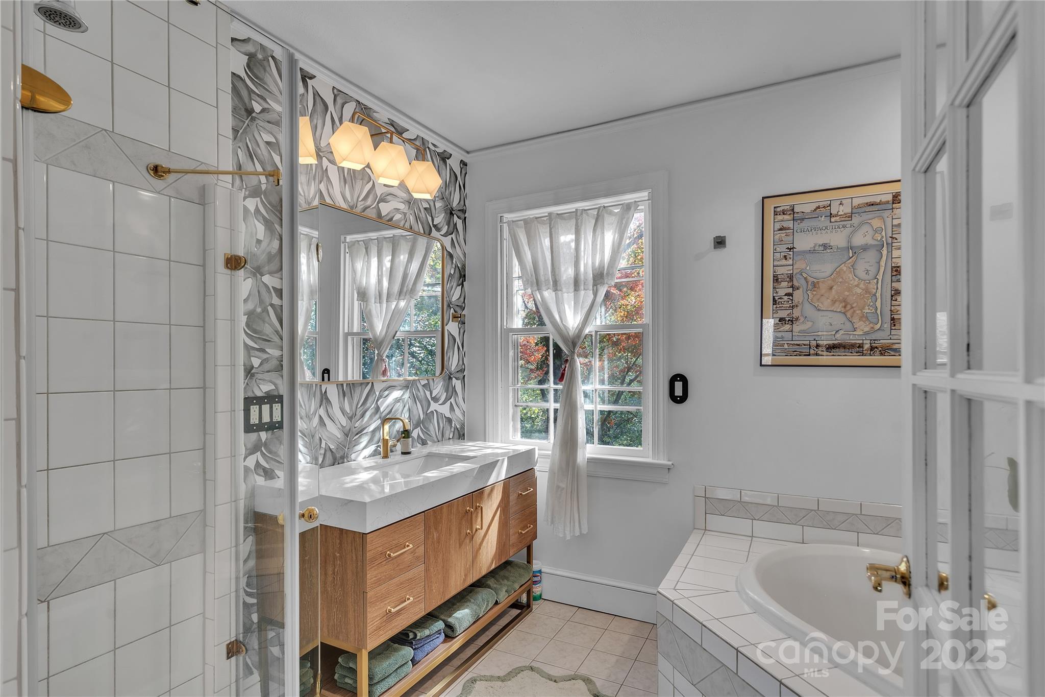 35 Wilcox Road Tryon, NC 28782 - Photo 14 of 24 a bathroom with a tub sink and mirror