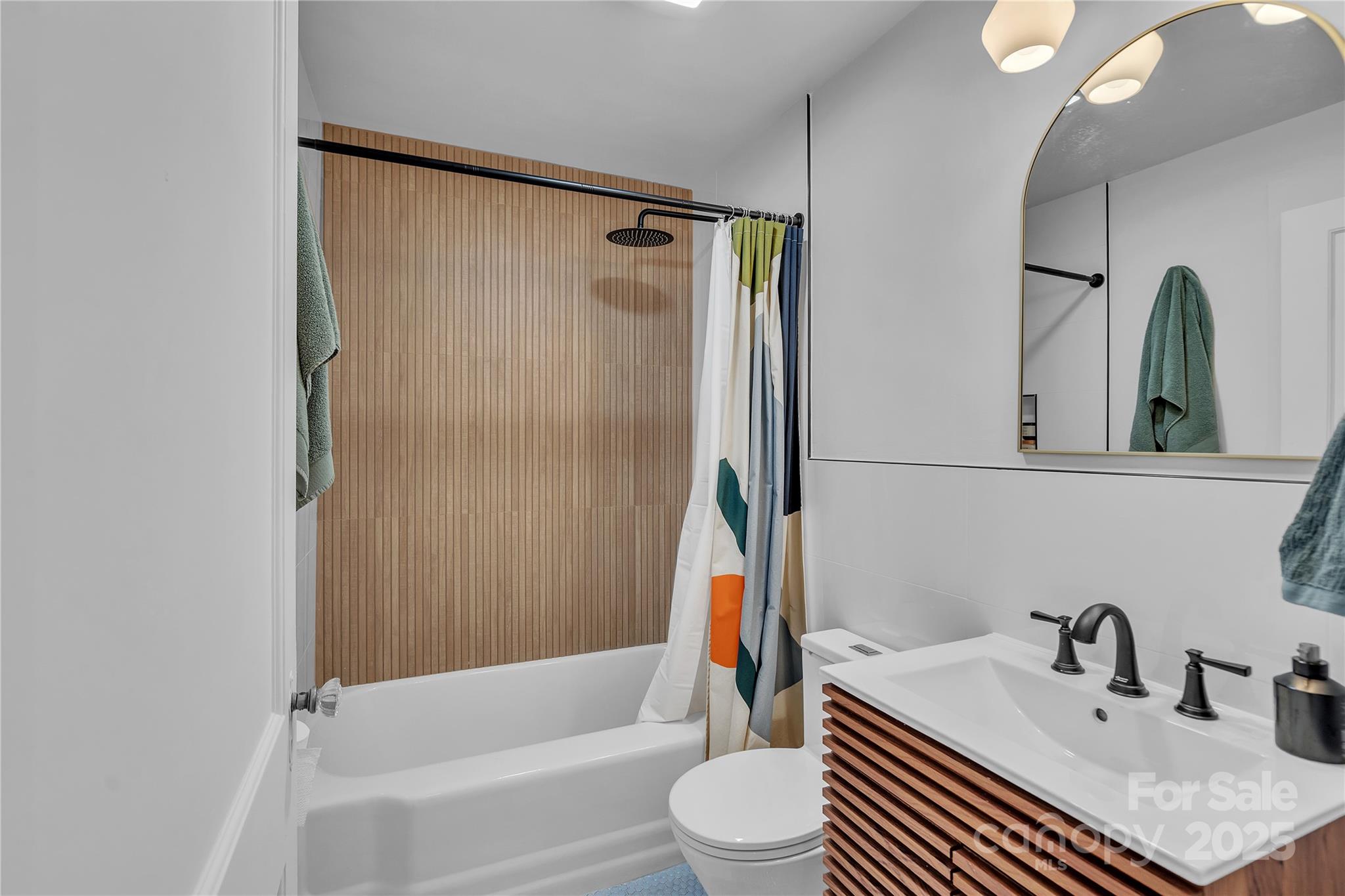 35 Wilcox Road Tryon, NC 28782 - Photo 18 of 24 a bathroom with a sink toilet and shower