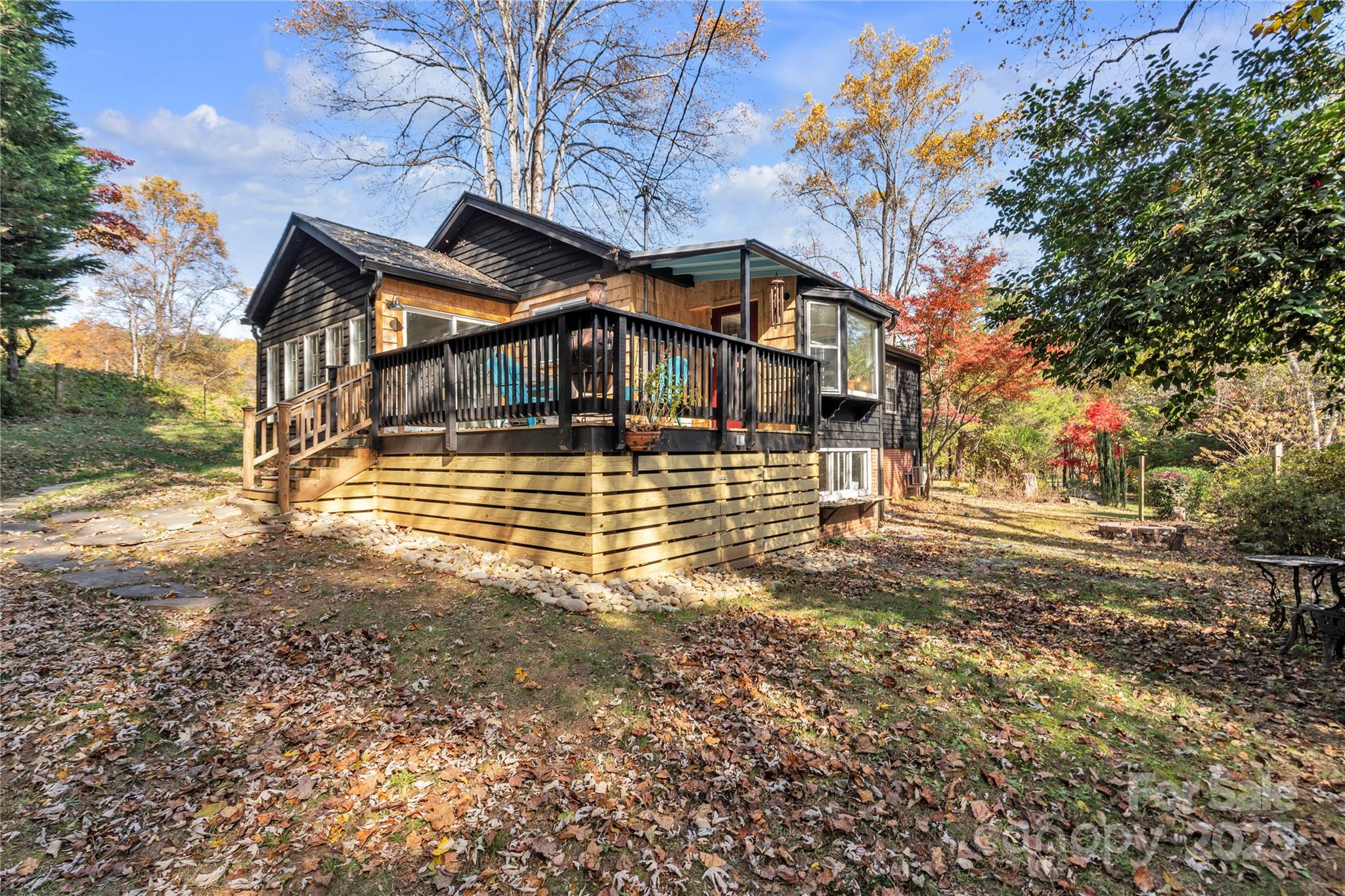35 Wilcox Road Tryon, NC 28782 - Photo 20 of 24 a front view of a house with a yard