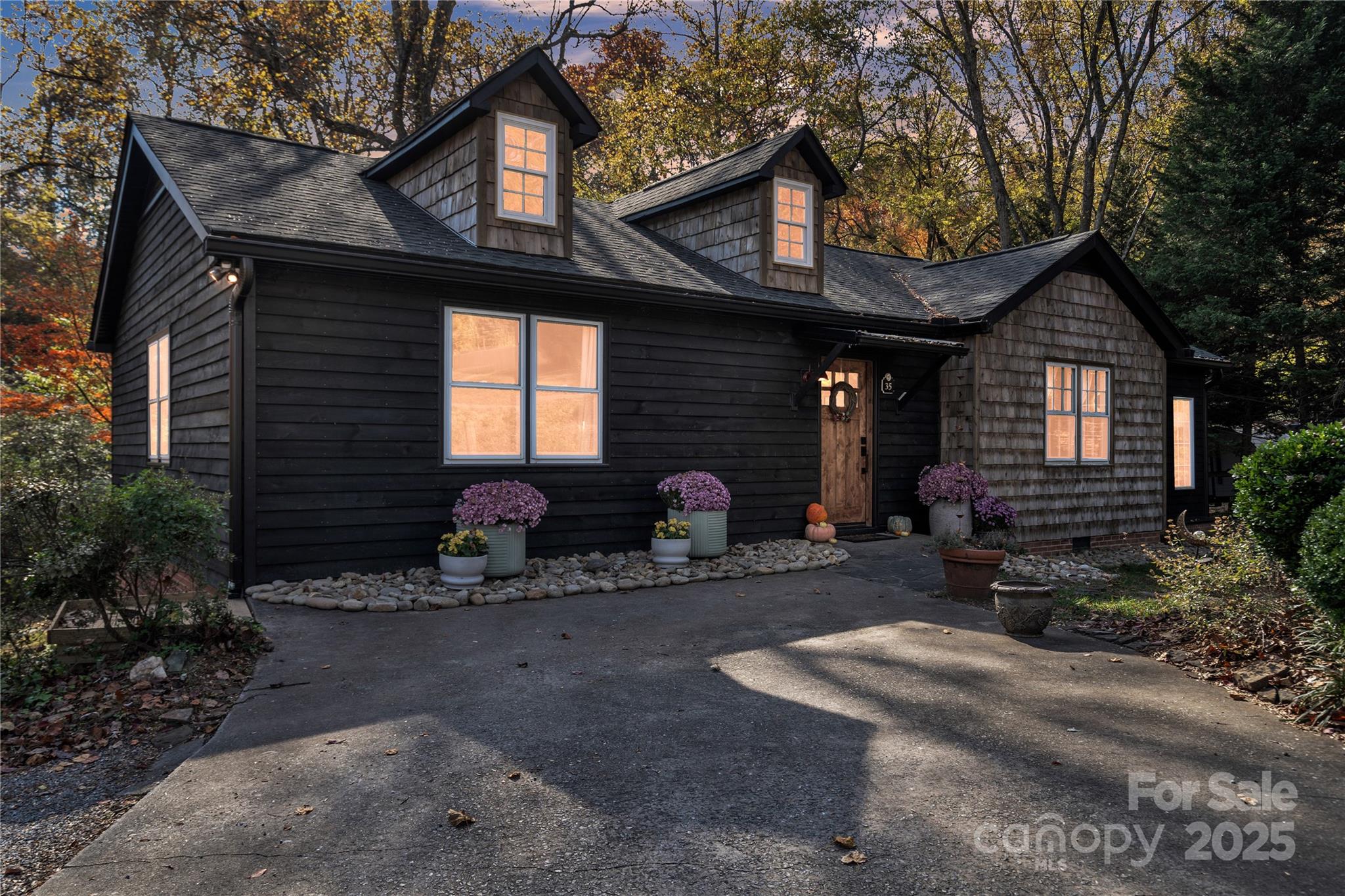35 Wilcox Road Tryon, NC 28782 - Photo 2 of 24 a view of a house with a patio