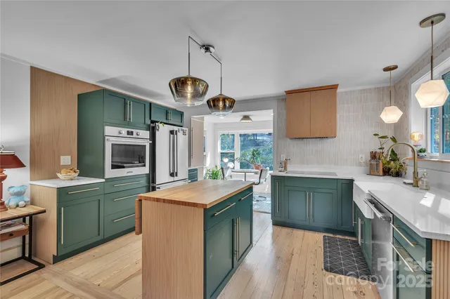 a work room with furniture and a potted plant