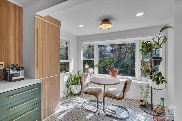 a bedroom with bed and a tv