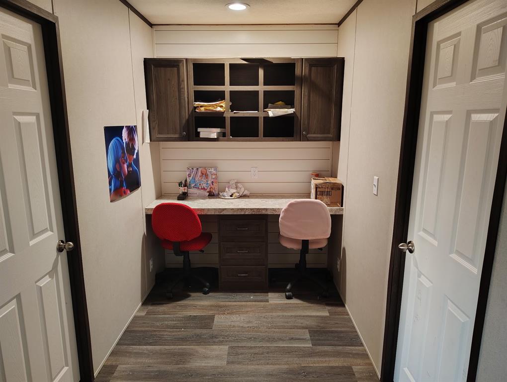 531 Blair Road Waxahachie, TX 75165 - Photo 6 of 40 Office with built in desk and dark wood-type flooring