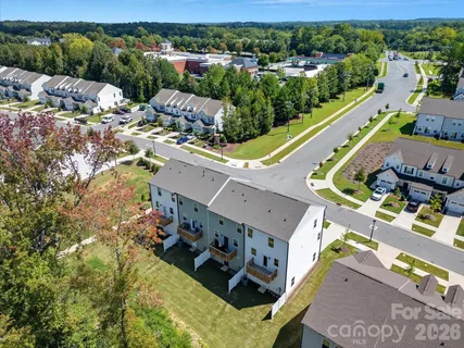 an aerial view of a house with a garden