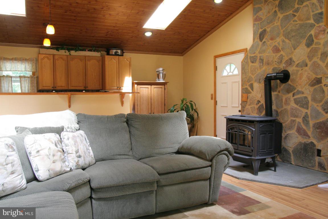 3162 A Pinch Road Manheim, PA 17545 - Photo 2 of 13 a living room with furniture a ceiling fan and a rug