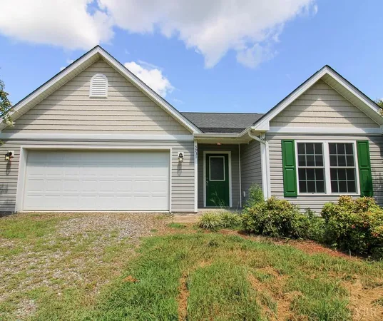 a front view of a house with garage