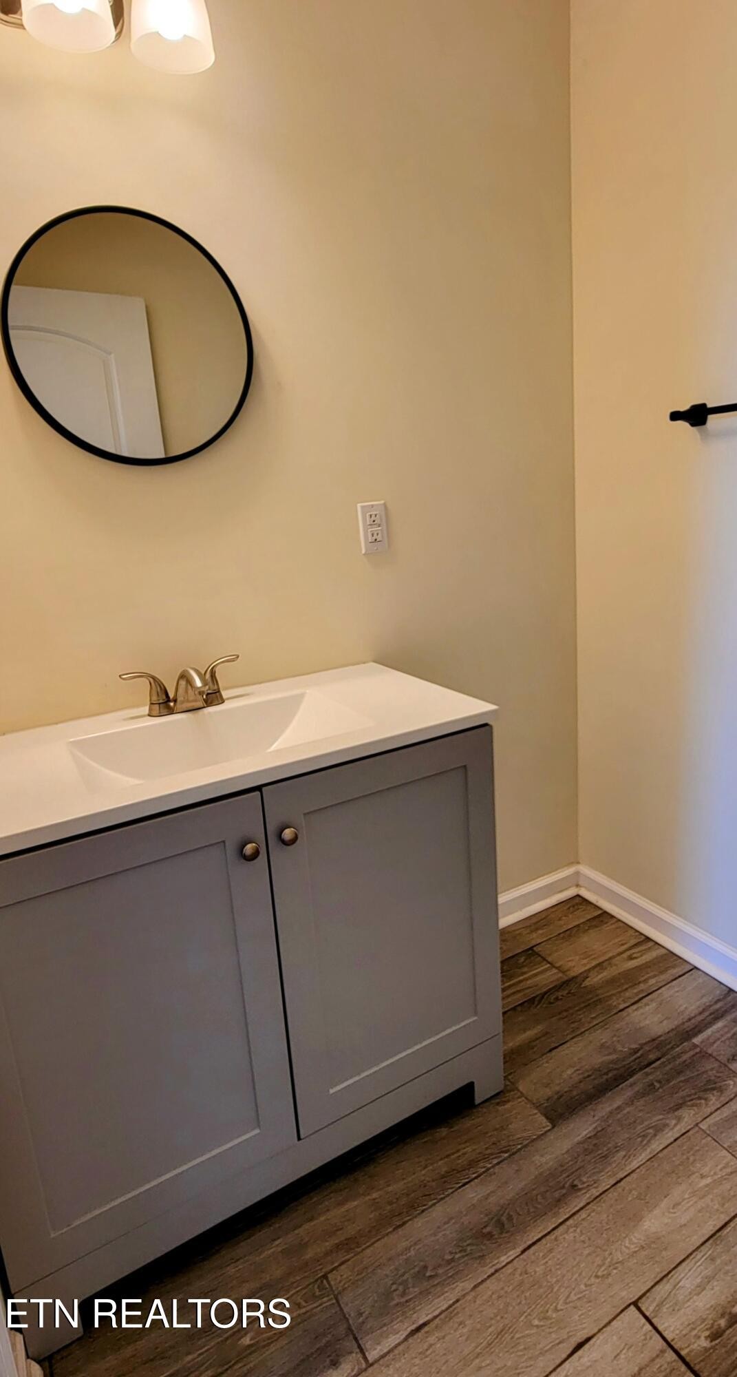 1571 Howell River Road Rutledge, TN 37861 - Photo 5 of 11 a bathroom with a sink and a mirror